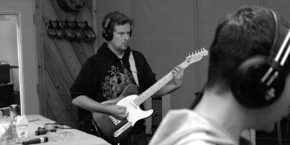 James on guitar while recording One-Offs