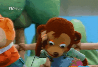 A picture of a stuffed monkey animal that looks like it just had its mind blown